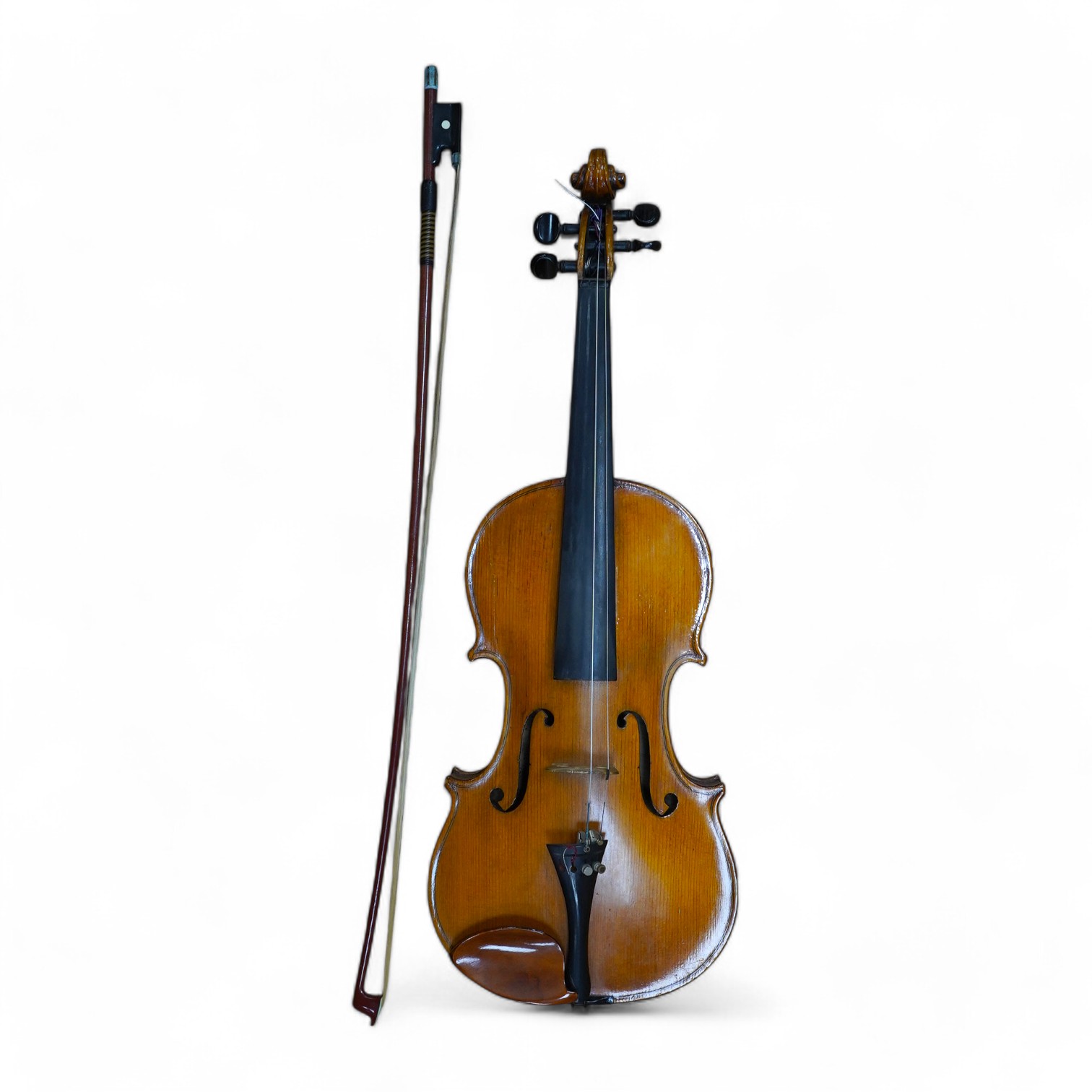 A cased early 20th century European violin, with label reading ‘Antonius Stradivarius Cremonenfis’, body length 36cm, with P&H London bow. Condition - good